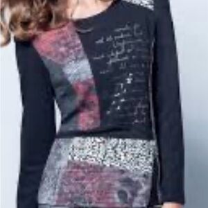 kallison Stretchy Black top with zipper and fabric patches. Rhinestone trim XL.